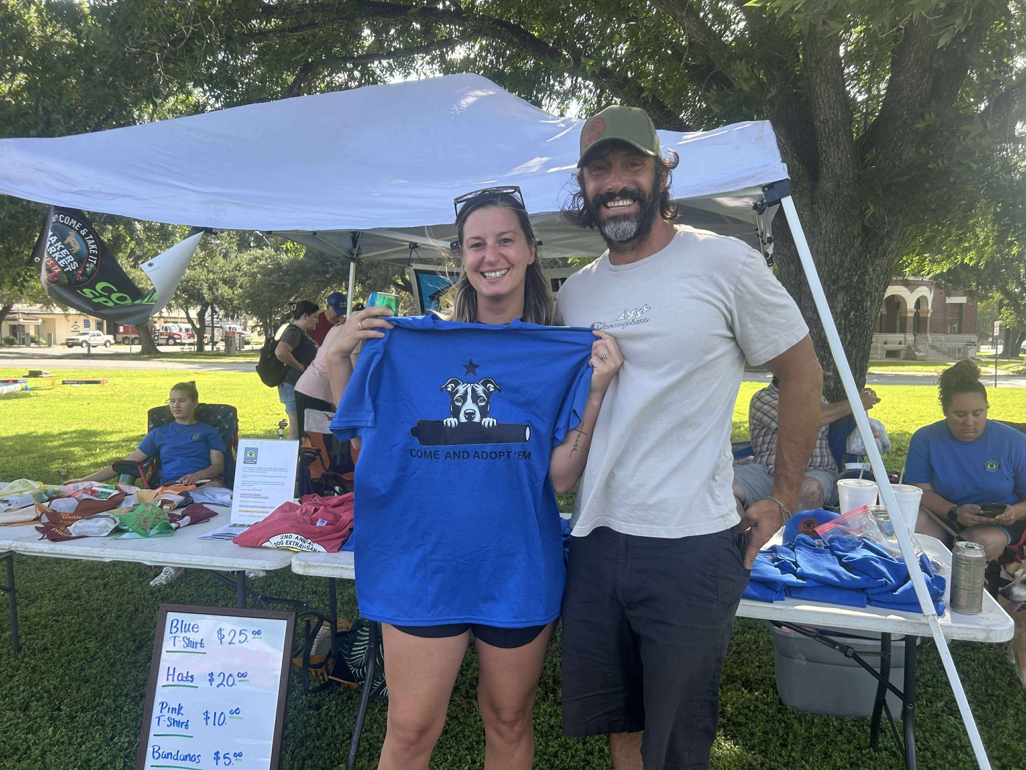Volunteer selling shirts